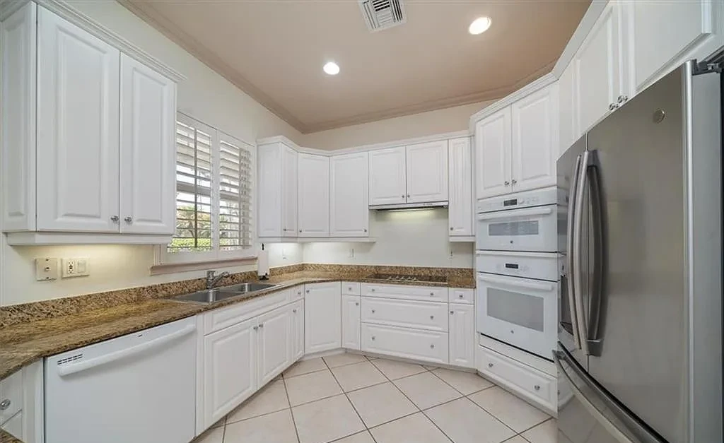 Inset Cabinetry With Transitional Or Estate Level Detailing Kitchen Remodel in Naples, FL by Cutting Edge Contractors project photo 6