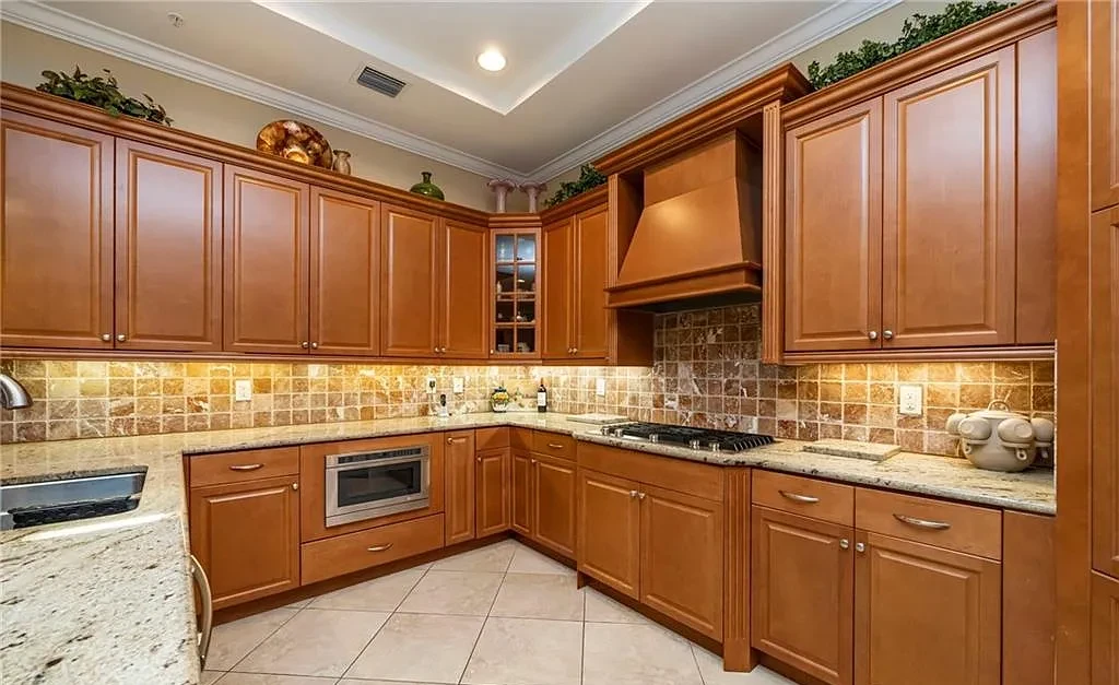 Inset Cabinetry With Transitional Or Estate Level Detailing Kitchen Remodel in Naples, FL by Cutting Edge Contractors project photo 4